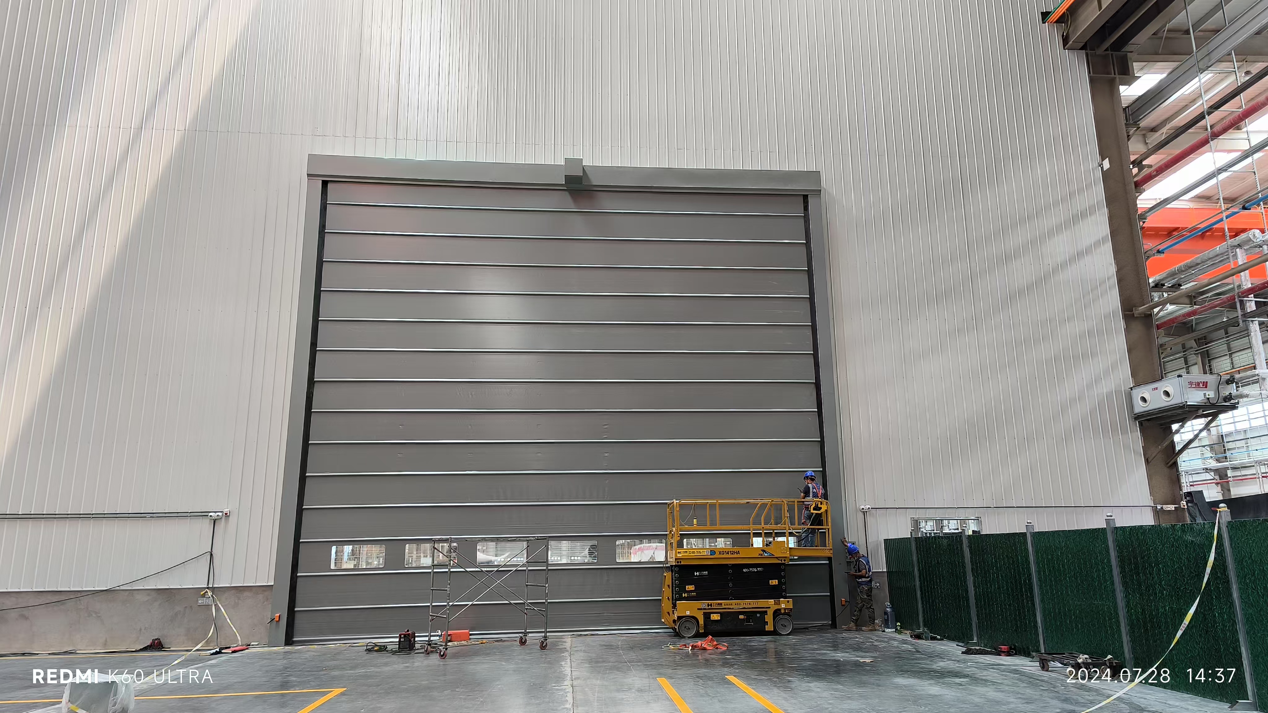 超大堆積門助力工業(yè)廠房制造建設(shè)，提高效果、低碳節(jié)能